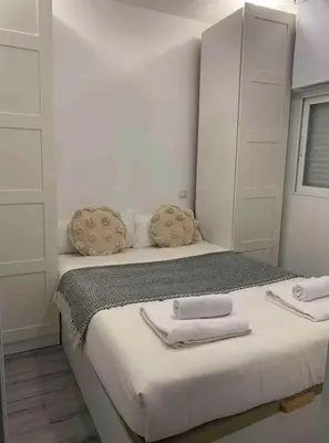 Cama o camas de una habitación en Ático en Madrid Rio(Parking opcional bajo disponibilidad)