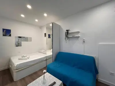 Cama o camas de una habitación en Centrally located flat in Madrid M80.8