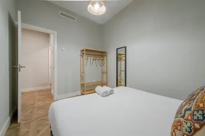 Cama o camas de una habitación en Escapada urbana para 8 en Calle del Infante GL