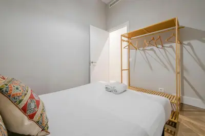 Cama o camas de una habitación en Escapada urbana para 8 en Calle del Infante GL