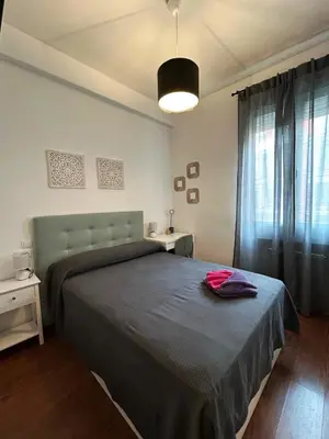 Cama o camas de una habitación en Habitaciones Magdalena
