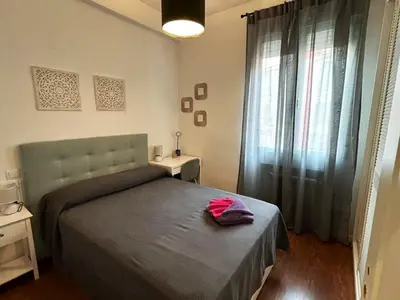 Cama o camas de una habitación en Habitaciones Magdalena