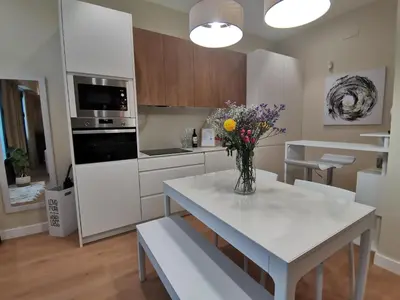 Una cocina o zona de cocina en Apartamento de Lujo - A 10 minutos del centro