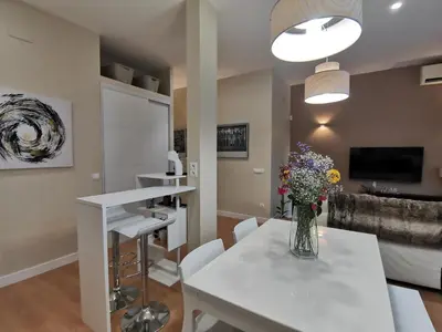 Una cocina o zona de cocina en Apartamento de Lujo - A 10 minutos del centro