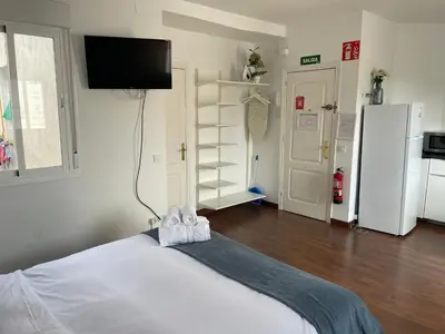 Cama o camas de una habitación en Estudio con Terraza Ibiza-Retiro I