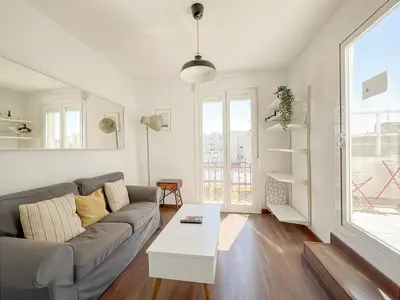 Zona de estar de Ático con Terraza en Madrid