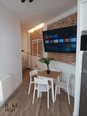 Una televisión o centro de entretenimiento en Francos Rodriguez2 Apartments