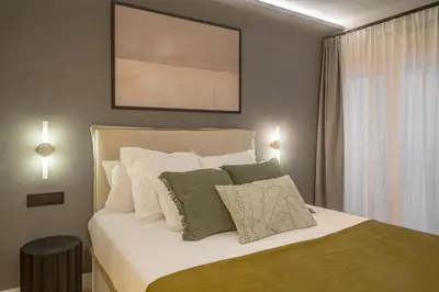 Cama o camas de una habitación en Malasaña X calle Barceló 4BR 4BH