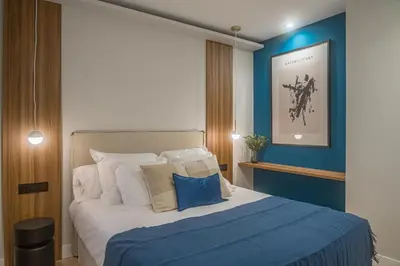 Cama o camas de una habitación en Malasaña X calle Barceló 4BR 4BH