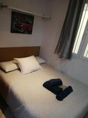 Cama o camas de una habitación en Microloft en Lavapiés, 15 metros