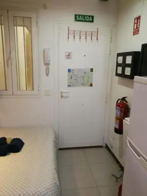 Cama o camas de una habitación en Microloft en Lavapiés, 15 metros
