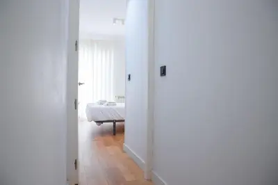 Cama o camas de una habitación en Madrid Río Suites
