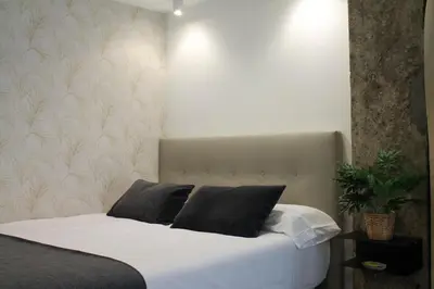 Cama o camas de una habitación en Style Madrid Center Santiago Bernabeu