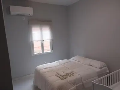 Cama o camas de una habitación en La Iniciativa 2: La luz y El camino