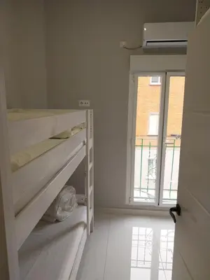 Cama o camas de una habitación en La Iniciativa 2: La luz y El camino