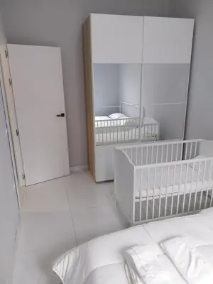 Cama o camas de una habitación en La Iniciativa 2: La luz y El camino