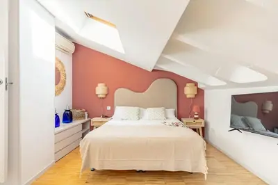 Cama o camas de una habitación en Heima Penthouse City Center