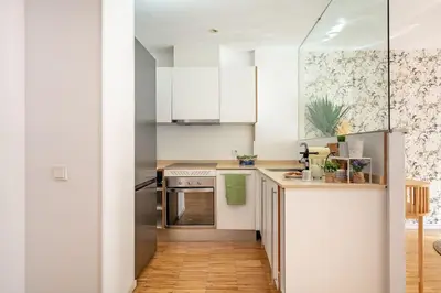 Una cocina o zona de cocina en Heima Penthouse City Center