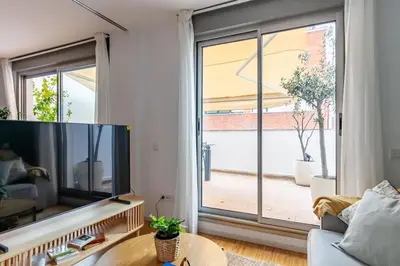 Una televisión o centro de entretenimiento en Heima Penthouse City Center
