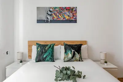 Cama o camas de una habitación en Fuencarral Center - Apartamento de 1 dormitorio en el Centro de Madrid