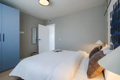 Cama o camas de una habitación en Puerto Alto Apartments by Olala Homes