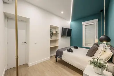 Cama o camas de una habitación en Luxe Apartment in Malasaña Hub