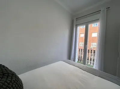 Cama o camas de una habitación en Cosy flat Arganzuela - AC