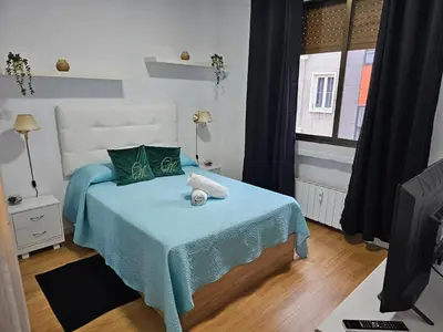 Cama o camas de una habitación en Apartamento Gran Via Madrid W8.1