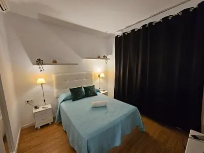 Cama o camas de una habitación en Apartamento Gran Via Madrid W8.1