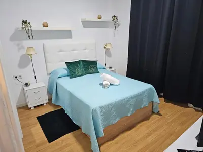 Cama o camas de una habitación en Apartamento Gran Via Madrid W8.1
