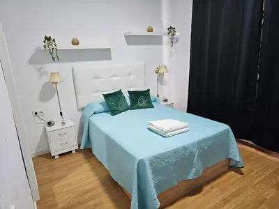 Cama o camas de una habitación en Apartamento Gran Via Madrid W8.1