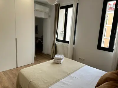 Cama o camas de una habitación en Moderno apartamento en pleno centro