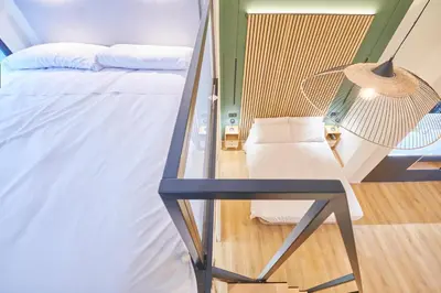 Cama o camas de una habitación en Madrid Urban Comfort