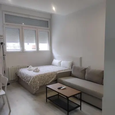 Cama o camas de una habitación en DH Estudios Lopez de Hoyos
