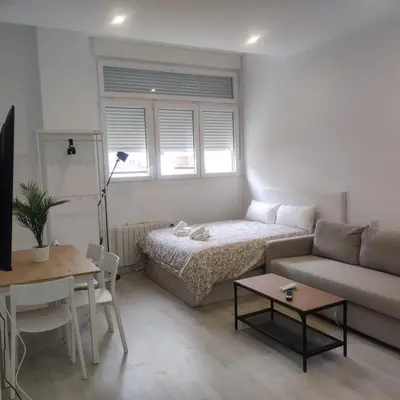 Cama o camas de una habitación en DH Estudios Lopez de Hoyos