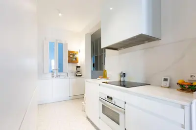 Una cocina o zona de cocina en Elegant apartment next to Paseo del Prado - Alameda