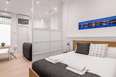 Cama o camas de una habitación en GuestReady - Confy Retreat in Madrid