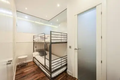 Cama o camas de una habitación en Luxury Apartment in Puerta del Sol Madrid