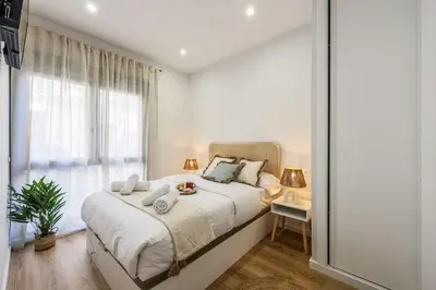Cama o camas de una habitación en Luxe apartments Madrid Rio by RentitUP