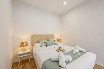 Cama o camas de una habitación en Luxe apartments Madrid Rio by RentitUP