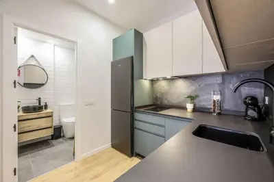 Una cocina o zona de cocina en Luxe apartments Madrid Rio by RentitUP