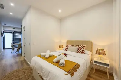 Cama o camas de una habitación en Luxe apartments Madrid Rio by RentitUP