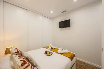 Cama o camas de una habitación en Luxe apartments Madrid Rio by RentitUP