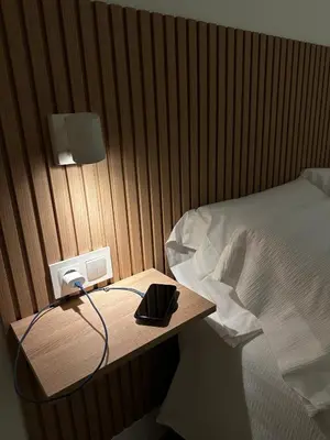 Cama o camas de una habitación en Apartamentos Moncloa