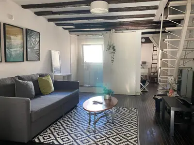 Zona de estar de Cozy Duplex in Malasaña - Ac10