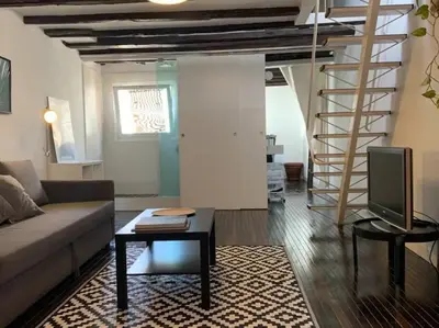 Zona de estar de Cozy Duplex in Malasaña - Ac10