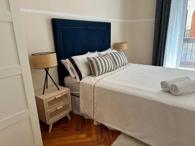 Cama o camas de una habitación en Plaza Ópera habitación privada
