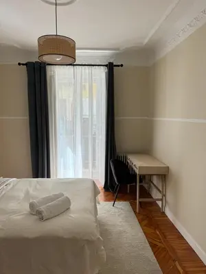 Cama o camas de una habitación en Plaza Ópera habitación privada