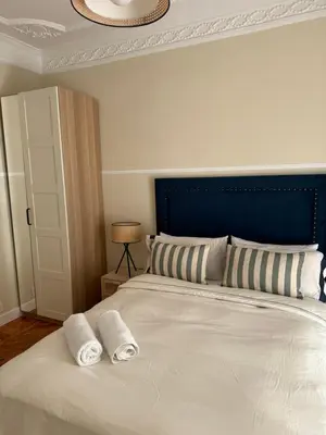 Cama o camas de una habitación en Plaza Ópera habitación privada