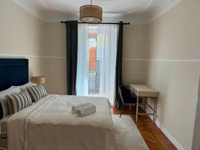 Cama o camas de una habitación en Plaza Ópera habitación privada
